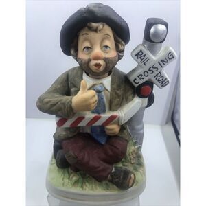 MELODY IN MOTION Railroad Cross Willie Figure Hobo Clown Music Box Doesn’t Work